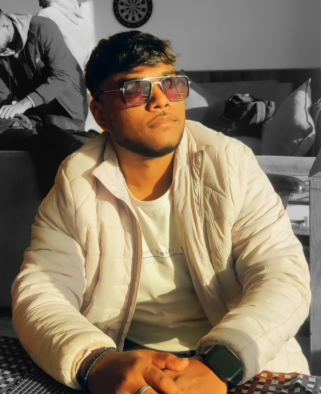 Professional portrait of Naveen Kumar, a skilled full-stack developer working in a modern tech environment